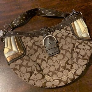 Neutral colored Coach shoulder bag